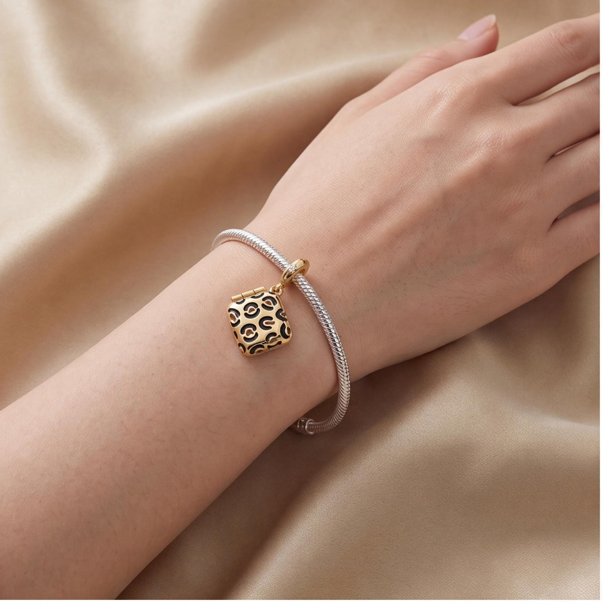 Leopard Compact Dangle on a silver charm bracelet
