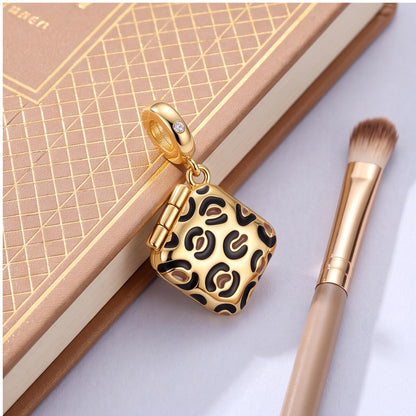 Leopard Compact Dangle styled as a gift