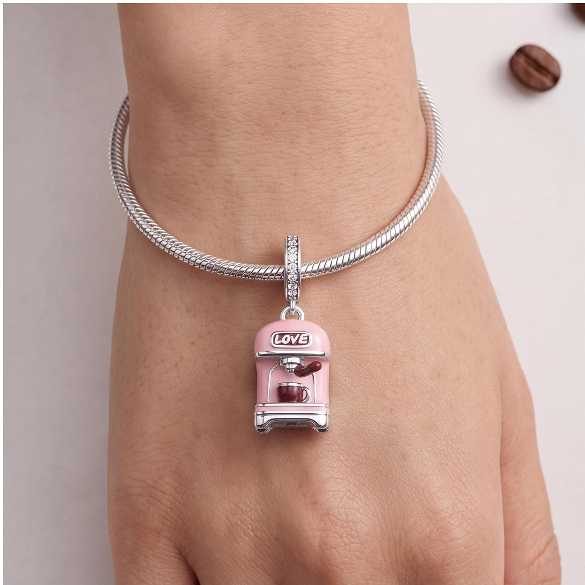 Coffee Machine Charm close-up on a bracelet