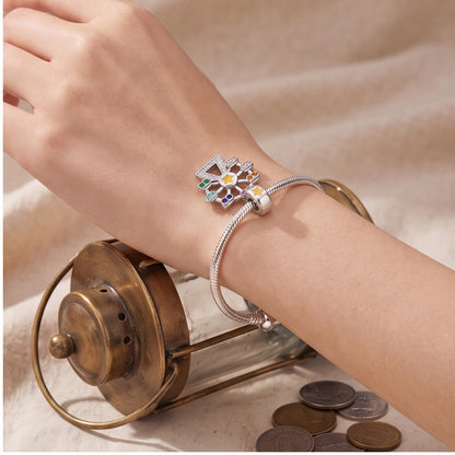Rainbow Ferris Wheel Dangle close-up on a bracelet