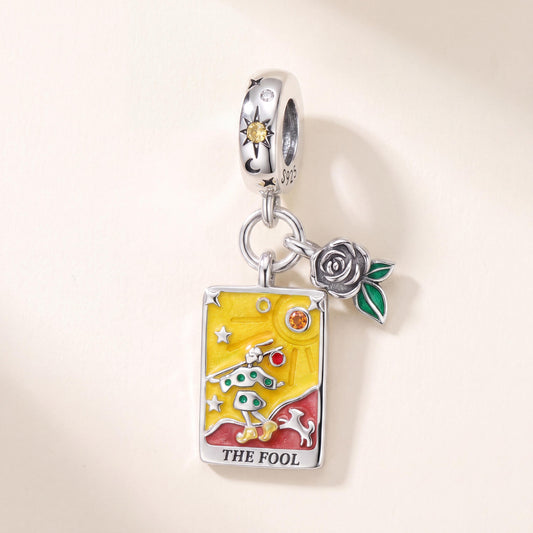 The Fool Tarot Dangle in 925 sterling silver with yellow and red enamel and sparkling stones