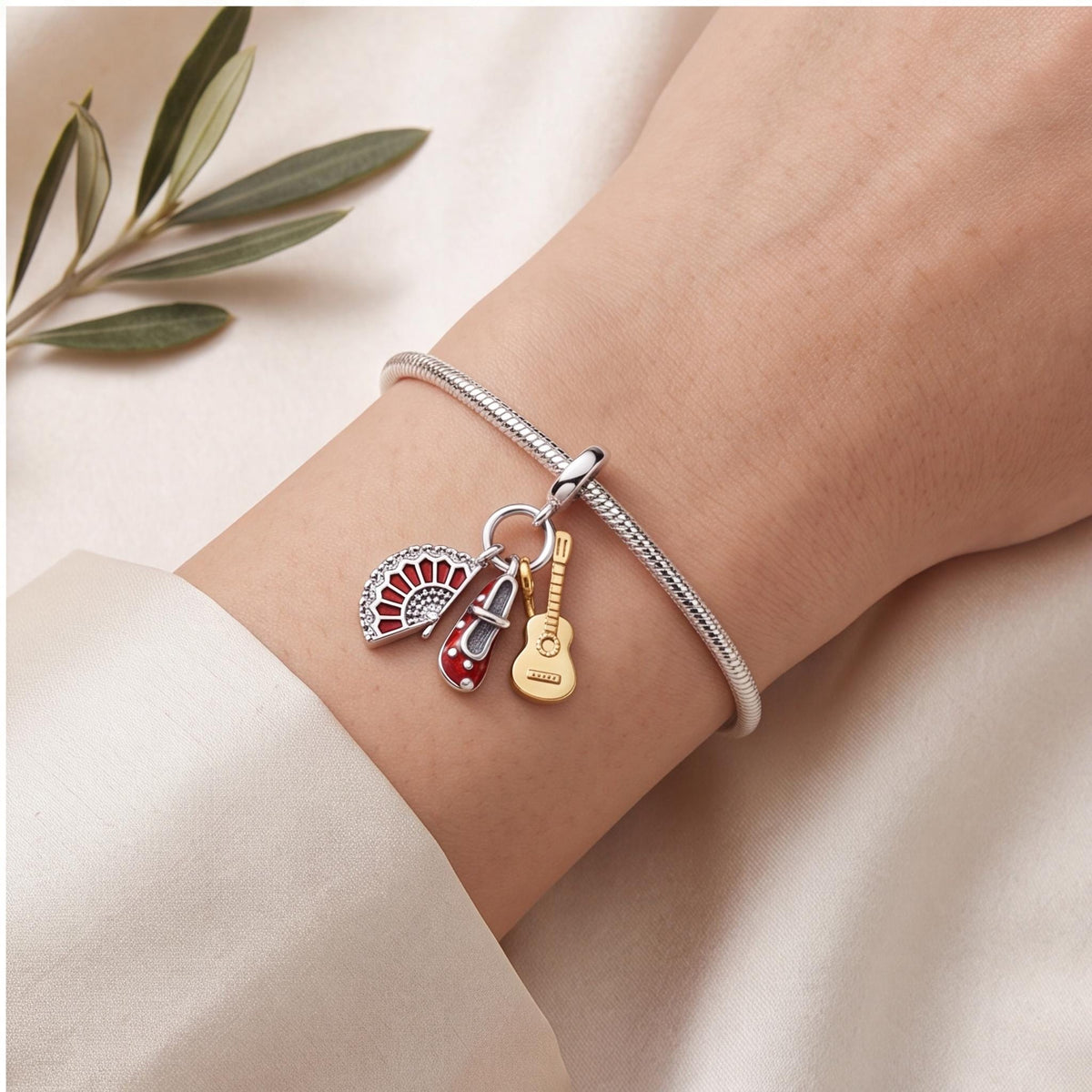 Flamenco Dangle Charm worn on a charm bracelet