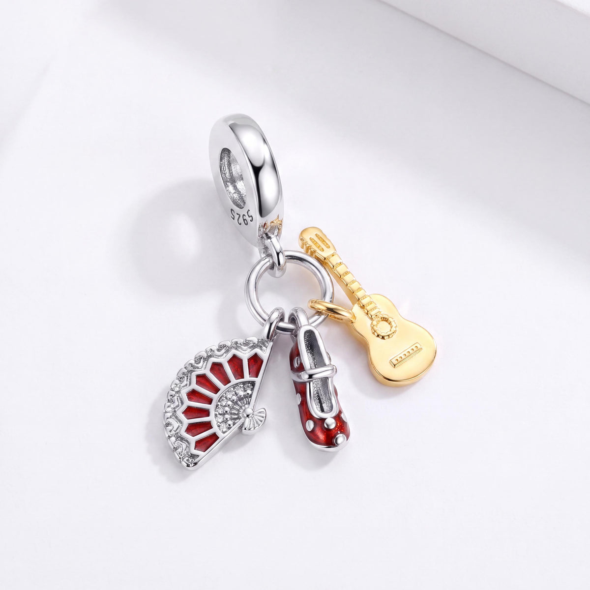 Flamenco Dangle Charm in 925 sterling silver with gold and red enamel and sparkling stones