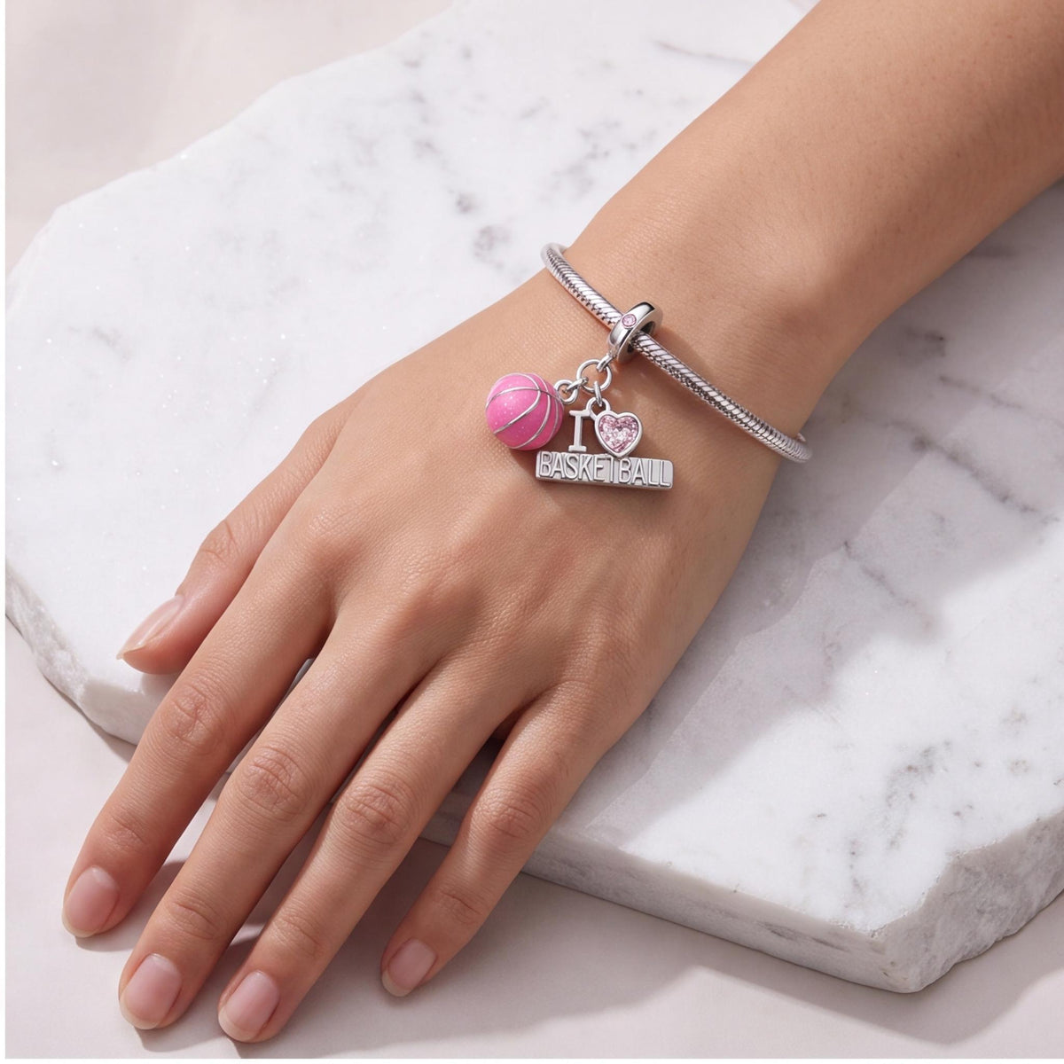 Basketball Dangle Charm worn on a charm bracelet
