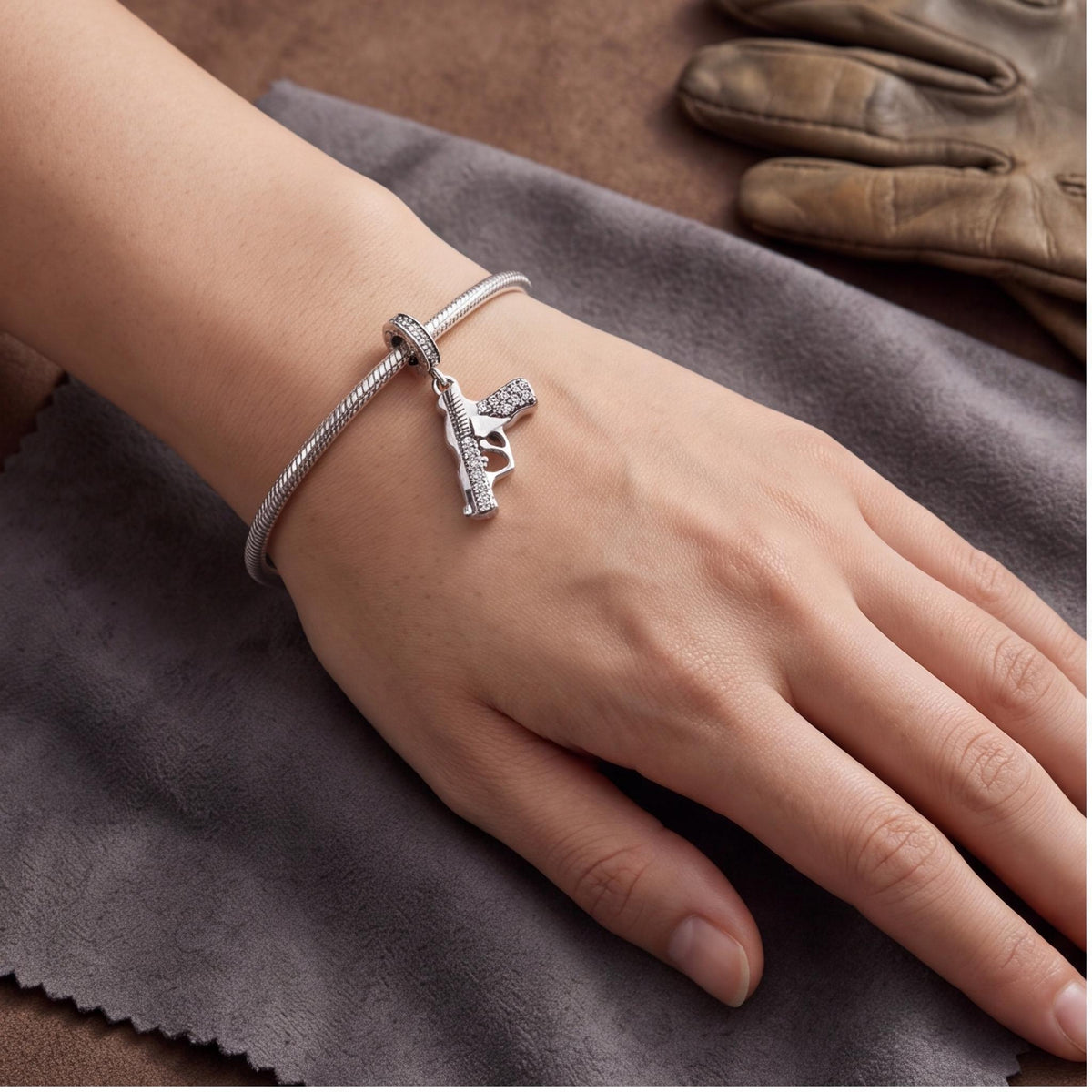 Gun Dangle Charm worn on a charm bracelet