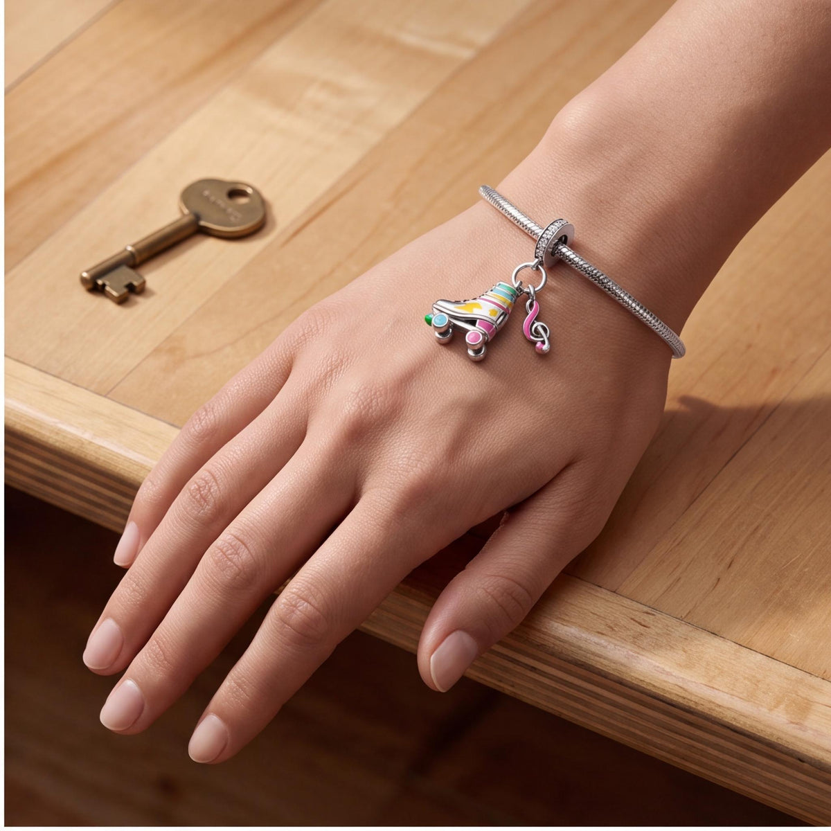 Roller Skate Dangle Charm close-up on a bracelet