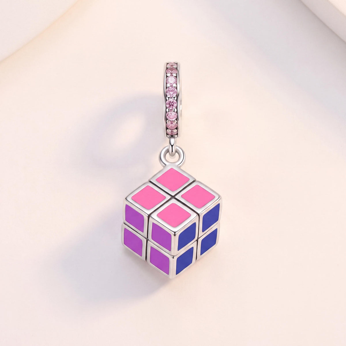 Puzzle Cube Dangle Charm in 925 sterling silver with pink and purple enamel and sparkling stones