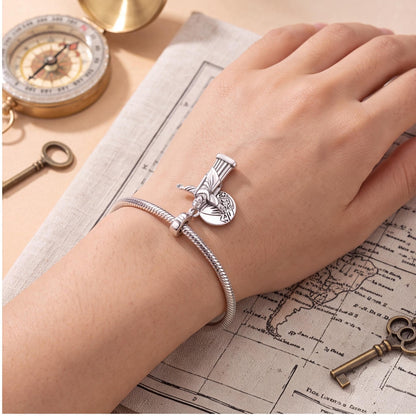 Christ Redeemer Dangle close-up on a bracelet