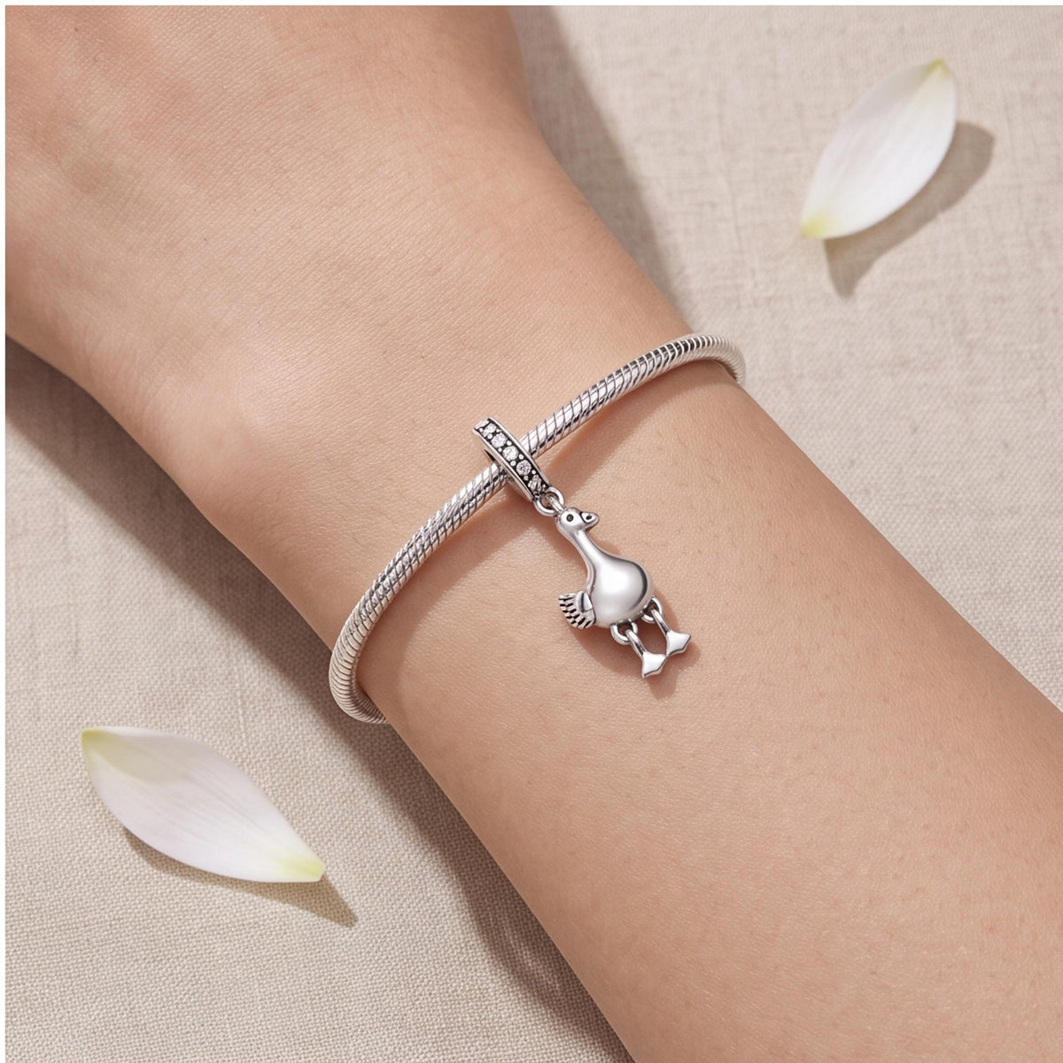 Dodo Bird Dangle Charm worn on a charm bracelet