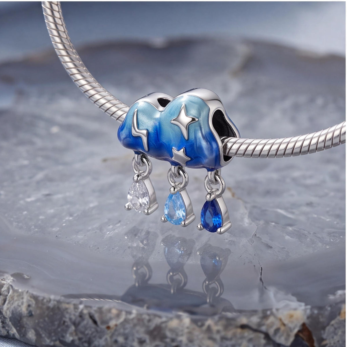 Storm Cloud Rain Charm close-up on a bracelet