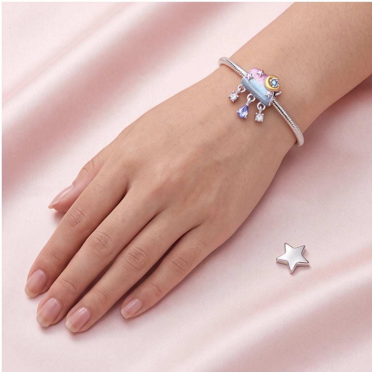 Moon Cloud Charm worn on a charm bracelet