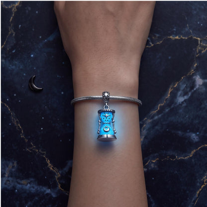 Celestial Hourglass Dangle close-up on a bracelet