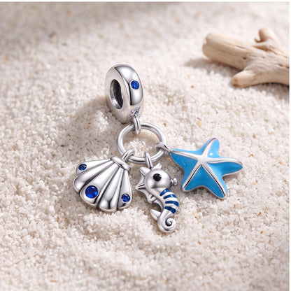 Ocean Trio Dangle Charm on a silver charm bracelet