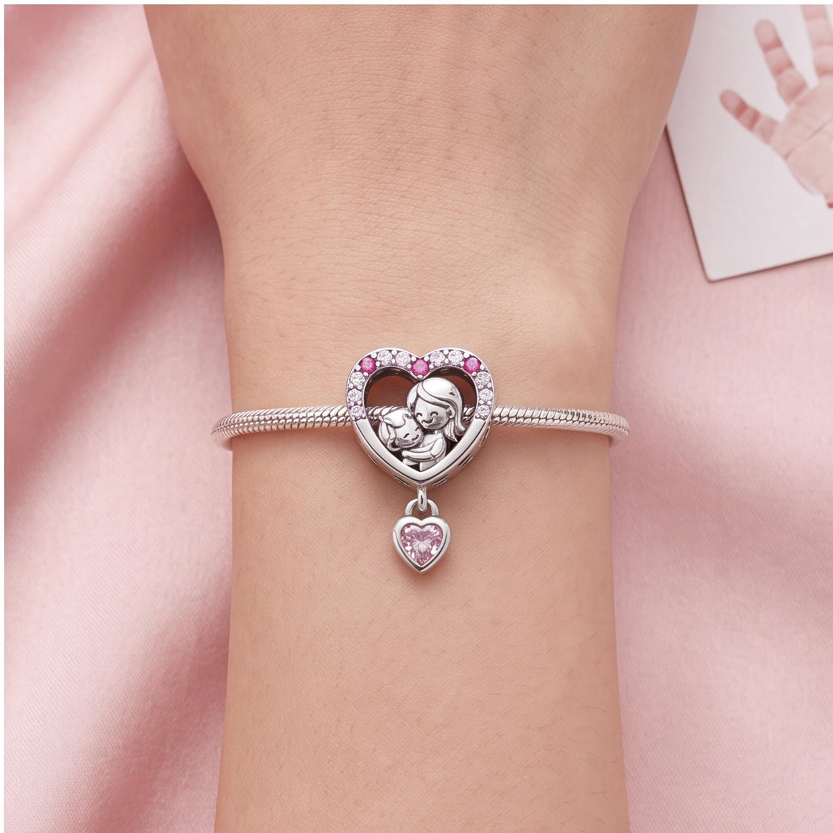 Mother Child Heart Dangle close-up on a bracelet