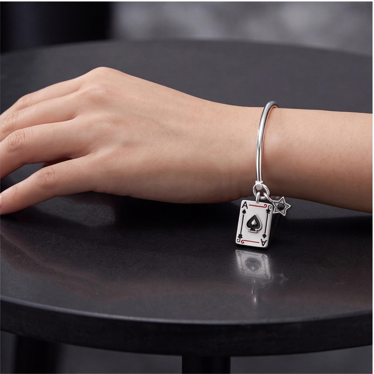 Ace of Spades Charm close-up on a bracelet