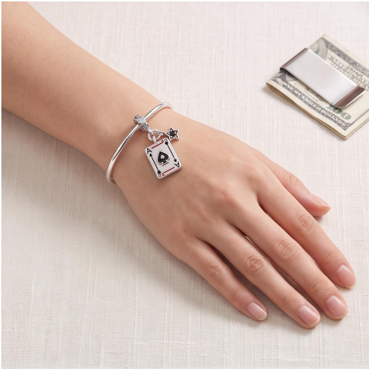 Ace of Spades Charm worn on a charm bracelet