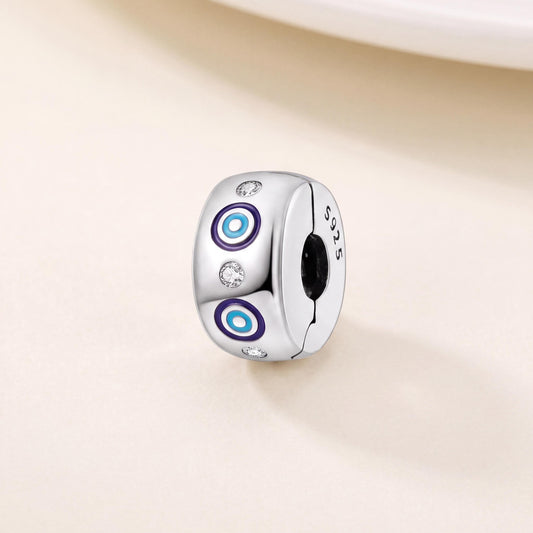 Evil Eye Clip Bead in 925 sterling silver with blue enamel and sparkling stones, fits European-style charm bracelets