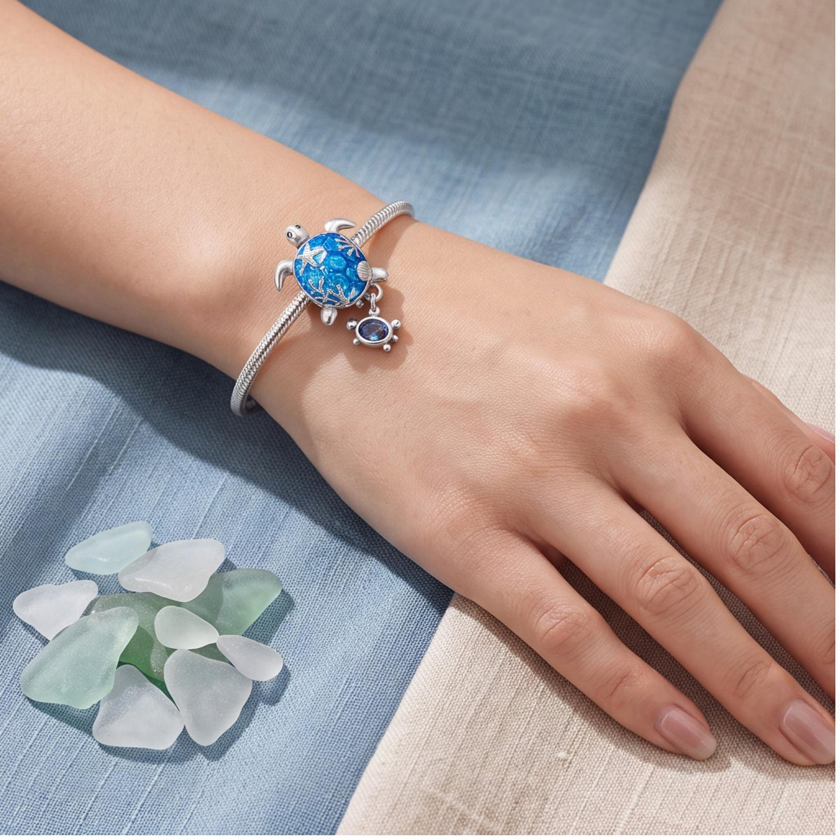 Mother Turtle Charm worn on a charm bracelet
