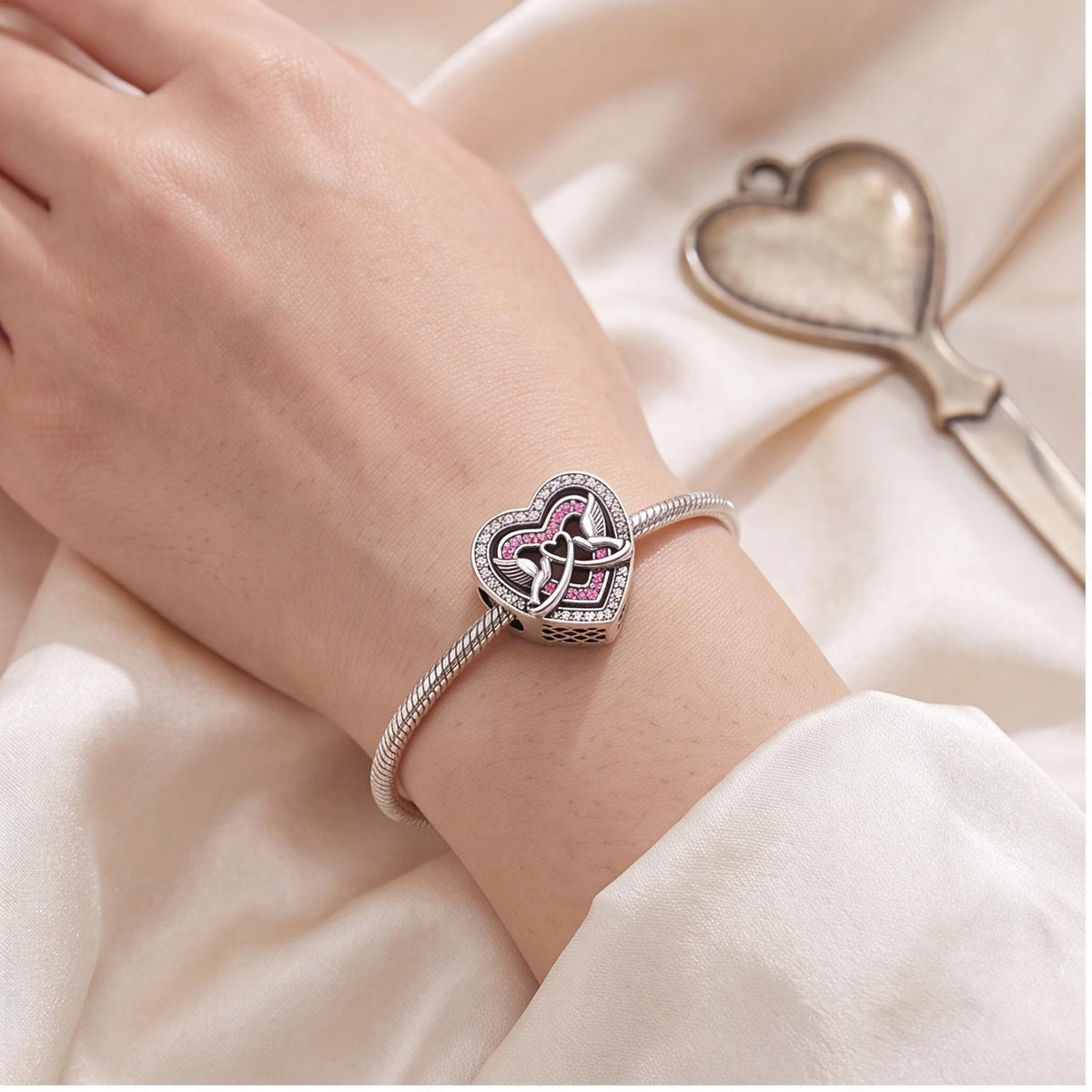 Love Doves Heart Bead close-up on a bracelet