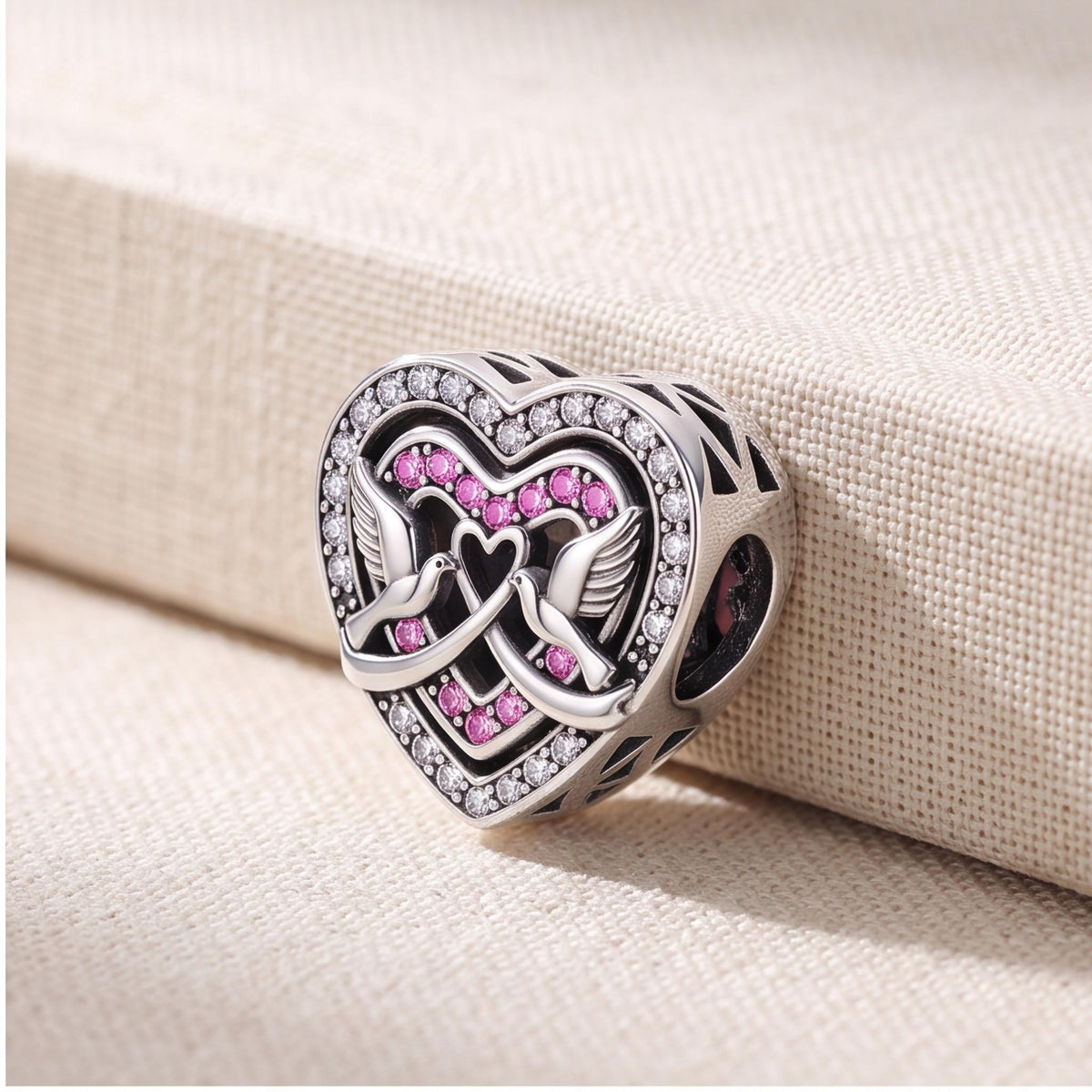 Love Doves Heart Bead on a silver charm bracelet