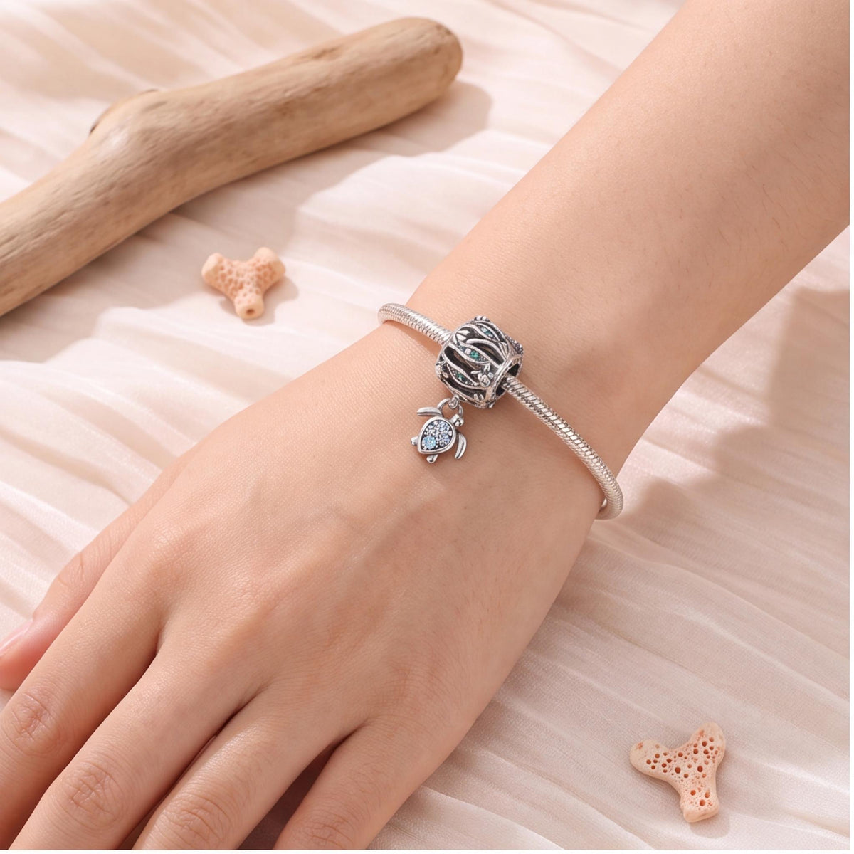 Ocean Wave Sea Turtle Dangle worn on a charm bracelet
