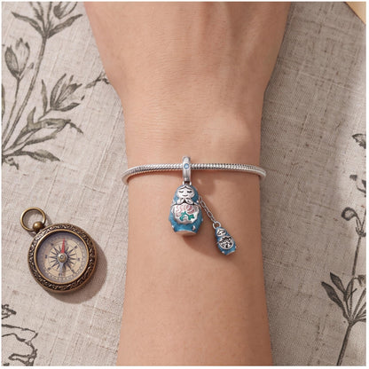 Nesting Doll Dangle worn on a charm bracelet