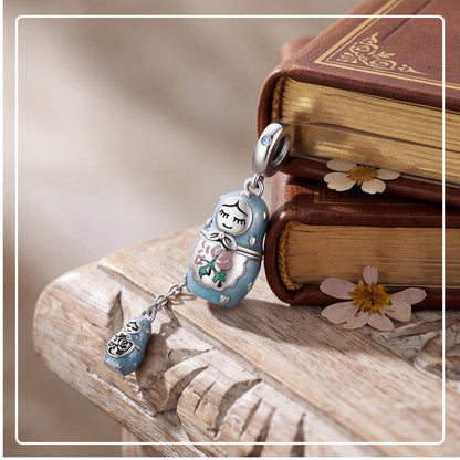 Nesting Doll Dangle styled as a gift