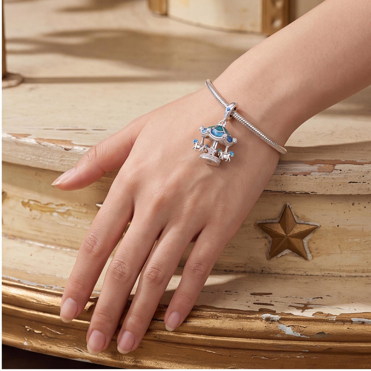 Carousel Dangle Charm worn on a charm bracelet