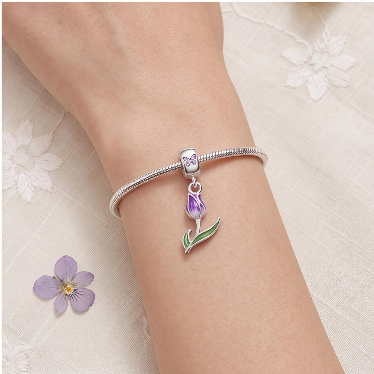 Purple Tulip Dangle worn on a charm bracelet