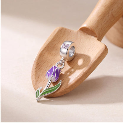 Purple Tulip Dangle styled as a gift