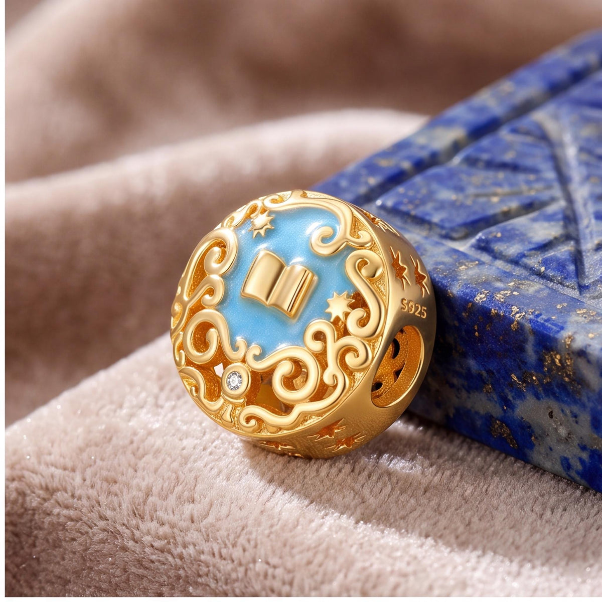 Magic Book Bead on a silver charm bracelet