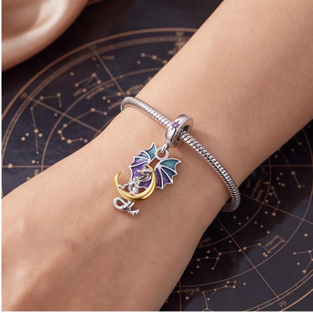 Dragon Moon Charm close-up on a bracelet
