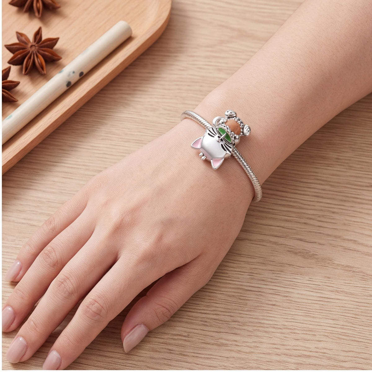 Cat Bubble Tea Charm worn on a charm bracelet