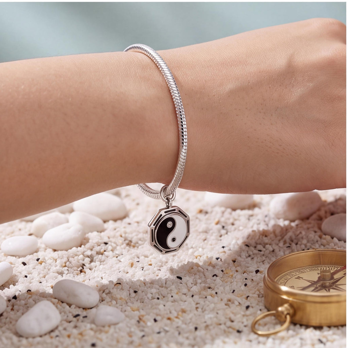 Yin Yang Bagua Charm close-up on a bracelet