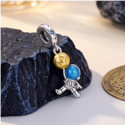 Astronaut Dangle Charm styled as a gift