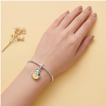 Cat Lemon Dangle Charm close-up on a bracelet
