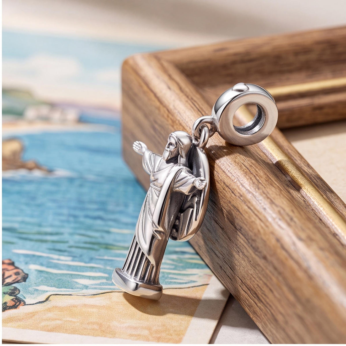 Christ Redeemer Dangle on a silver charm bracelet