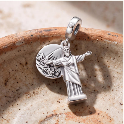 Christ Redeemer Dangle styled as a gift