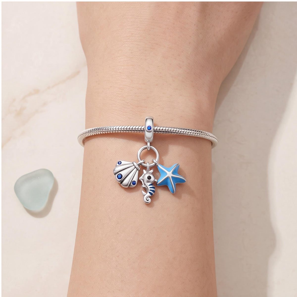 Ocean Trio Dangle Charm worn on a charm bracelet
