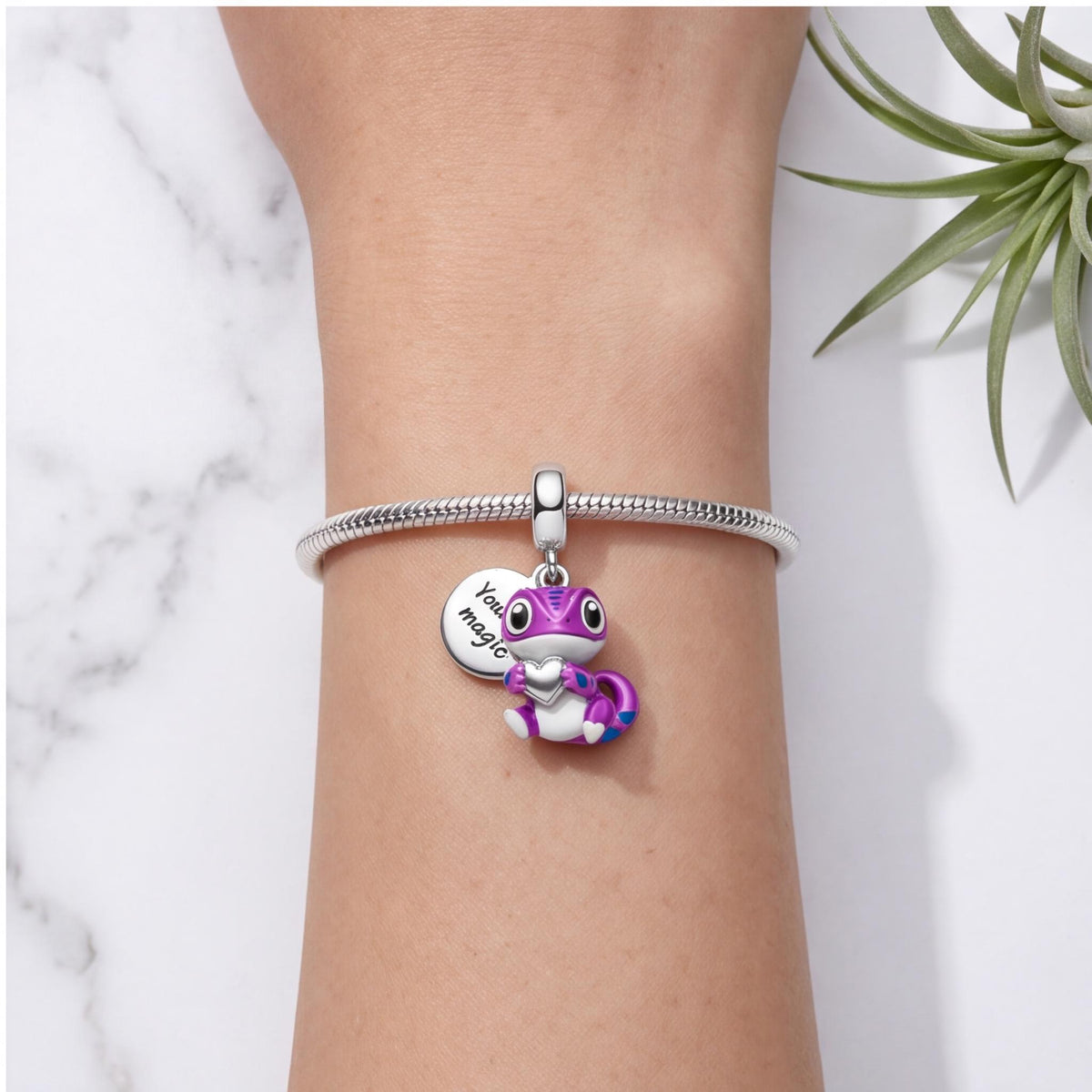 Magic Gecko Charm worn on a charm bracelet