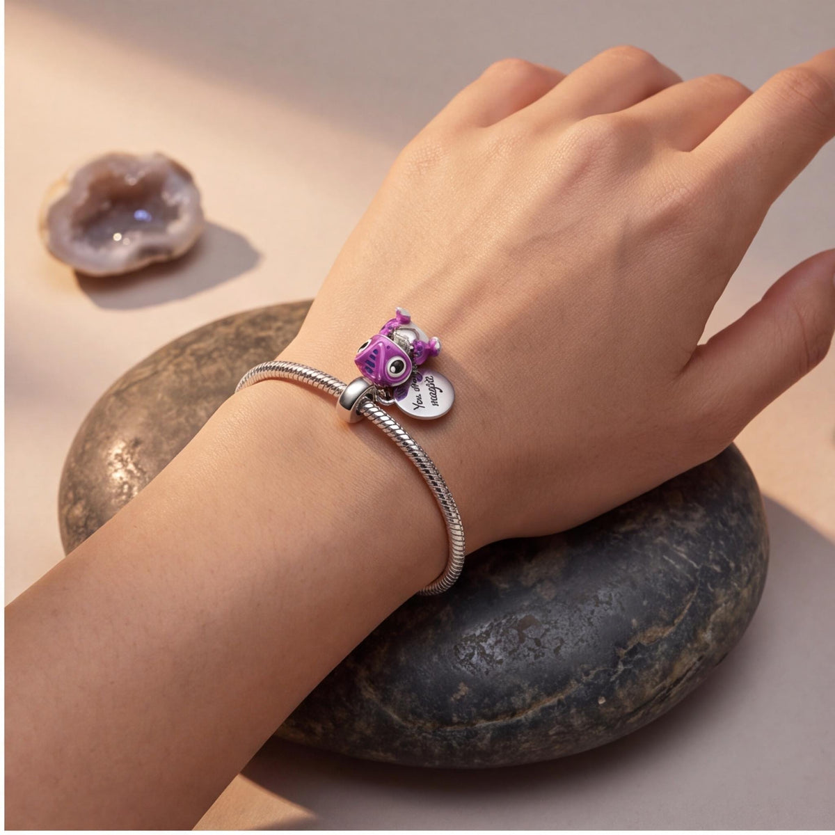 Magic Gecko Charm close-up on a bracelet
