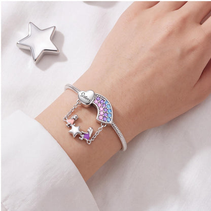 Sisters Rainbow Charm worn on a charm bracelet
