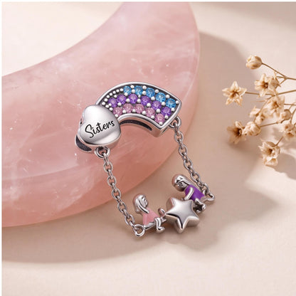 Sisters Rainbow Charm on a silver charm bracelet