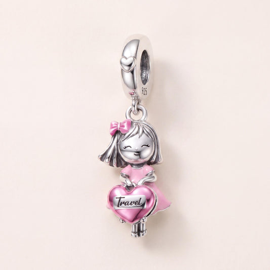Travel Girl Charm in 925 sterling silver with pink enamel, fits European-style charm bracelets