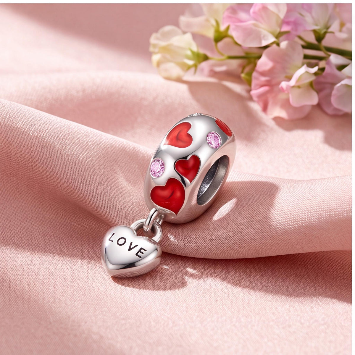 Red Enamel Love Heart Charm on a silver charm bracelet