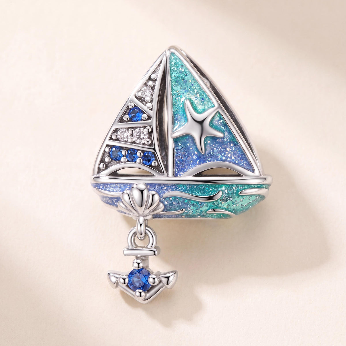 Blue Sailboat Charm in 925 sterling silver with blue enamel and sparkling stones, fits European-style charm bracelets
