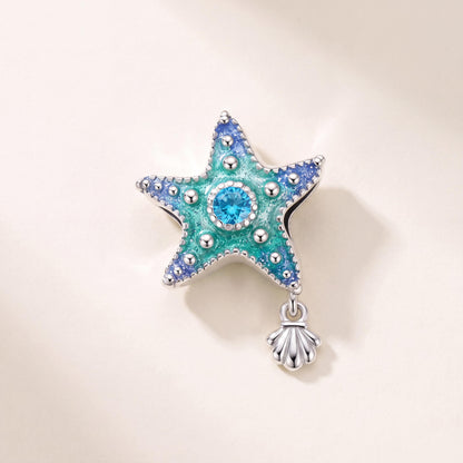 Blue Starfish Charm in 925 sterling silver with blue and green enamel and sparkling stones