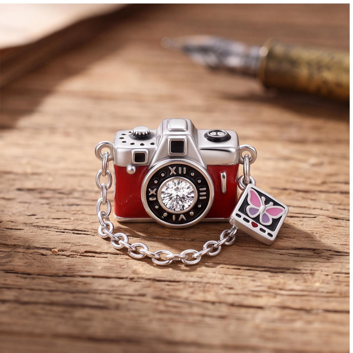 Red Camera Charm on a silver charm bracelet
