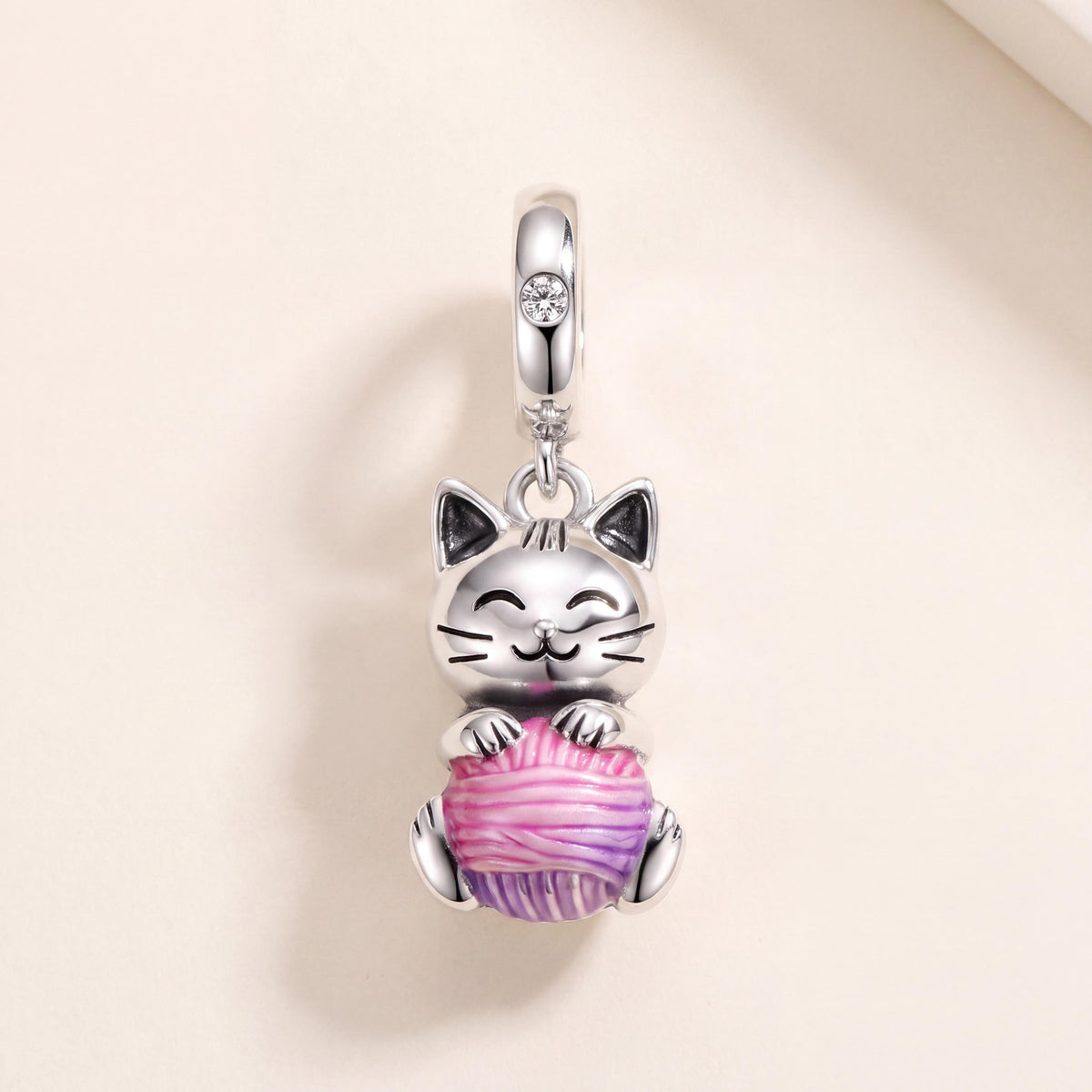Cat Yarn Ball Charm in 925 sterling silver with pink and purple enamel and sparkling stones
