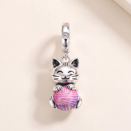 Cat Yarn Ball Charm in 925 sterling silver with pink and purple enamel and sparkling stones
